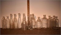 15 early clear glass bottles, tallest 8"h; as is