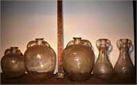 5 early large clear glass juice bottles; as is