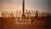 26 early small clear glass bottles, tallest 5.5"h;