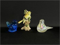 Glass and ceramic birds.