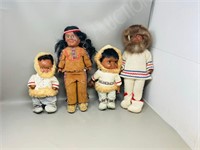 4 native dressed dolls