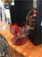 Cranberry glass with six mini pitchers