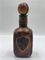 Vintage leather wrapped bottle Italy