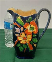 Hand painted pitcher