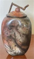 Illegible Marked Pottery Vase with Twig Accent