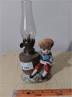 Vintage Boy Reading Oil Lamp Figurine