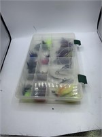 Cabela’s Plastic lure box with several Rock