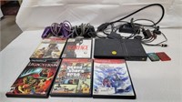 PS2 CONSOLE AND 5 GAMES AND MORE