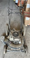 22" Gas Powered Lawnmower with large wheels.