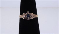 Unmarked rose & yellow gold blue sapphire and