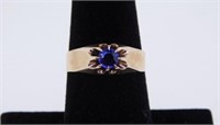 Hallmarked yellow gold blue sapphire ring