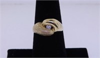 Unmarked yellow gold diamond ring, size 7 1/2