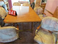 SQUARE DINING ROOM TABLE WITH 6 ROLL AROUND CHAIRS