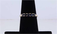 Unmarked yellow gold blue sapphire ring,