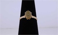 Unmarked yellow gold moonstone ring, size 6