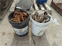 (2) 5 Gallon Pails of Free Stall Brackets - Used