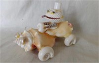 Vintage seashell art: Clam driving seashell car -
