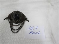 Broach with chains