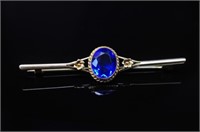 Antique 9ct rose gold & blue glass brooch