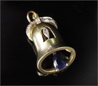 Yellow gold "bell" pendant set with sapphire