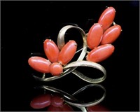 Large coral set yellow gold brooch