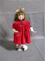 porclien doll with stand