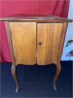 Wooden cabinet with two doors missing knob