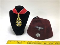 Metal badge & German hat