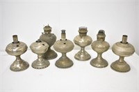 7 OIL LAMPS - NICKLEL PLATED - TALLEST IS 12.5"
