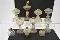 9 OIL LAMPS - TALLEST IS 16"