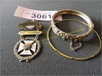 Three pieces vintage jewelry and badge lot