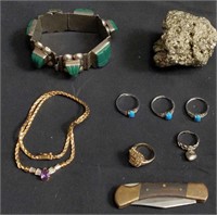 Group of costume jewelry, pyrite specimen