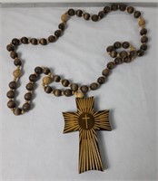 Large wood beaded necklace with a wood cross