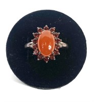 Sterling silver claw set coral cabochon ring with