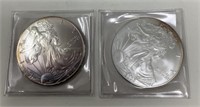 Pair Of 2002 Silver American Eagles.
