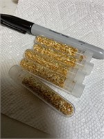 5 tubes of gold flakes