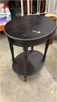 Black Oval 2-Tiered Side Table. Worn Spot on