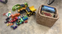 Basket of Kids Books, Tonka Dump Truck, and Toy