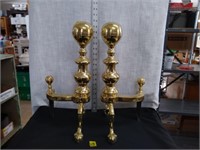 Brass fireplace andiron claw footed
