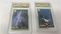 2 graded mint 9 Tiger Woods collector cards.