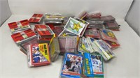 multiple packs of sealed baseball cards 1990s