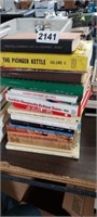 STACK OF MOSTLY COOKING BOOKS
