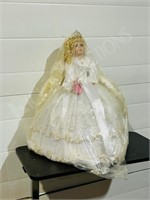 24" porcelain doll by Sabre- folding base