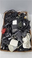 Large lot of cords, chargers, boxes, and other