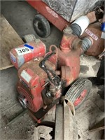 Water pump with Wisconsin engine , rope start. On