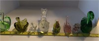 F6)  Assorted glass birds and one cat