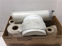 Various rolls of building fabric and plastic.