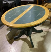 Oval oak table with green inlaid tile top - has