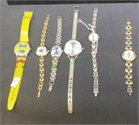 A mixed lot of ladies watches includes Relic,