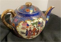 Beautiful hand-painted Chinese tea pot measures